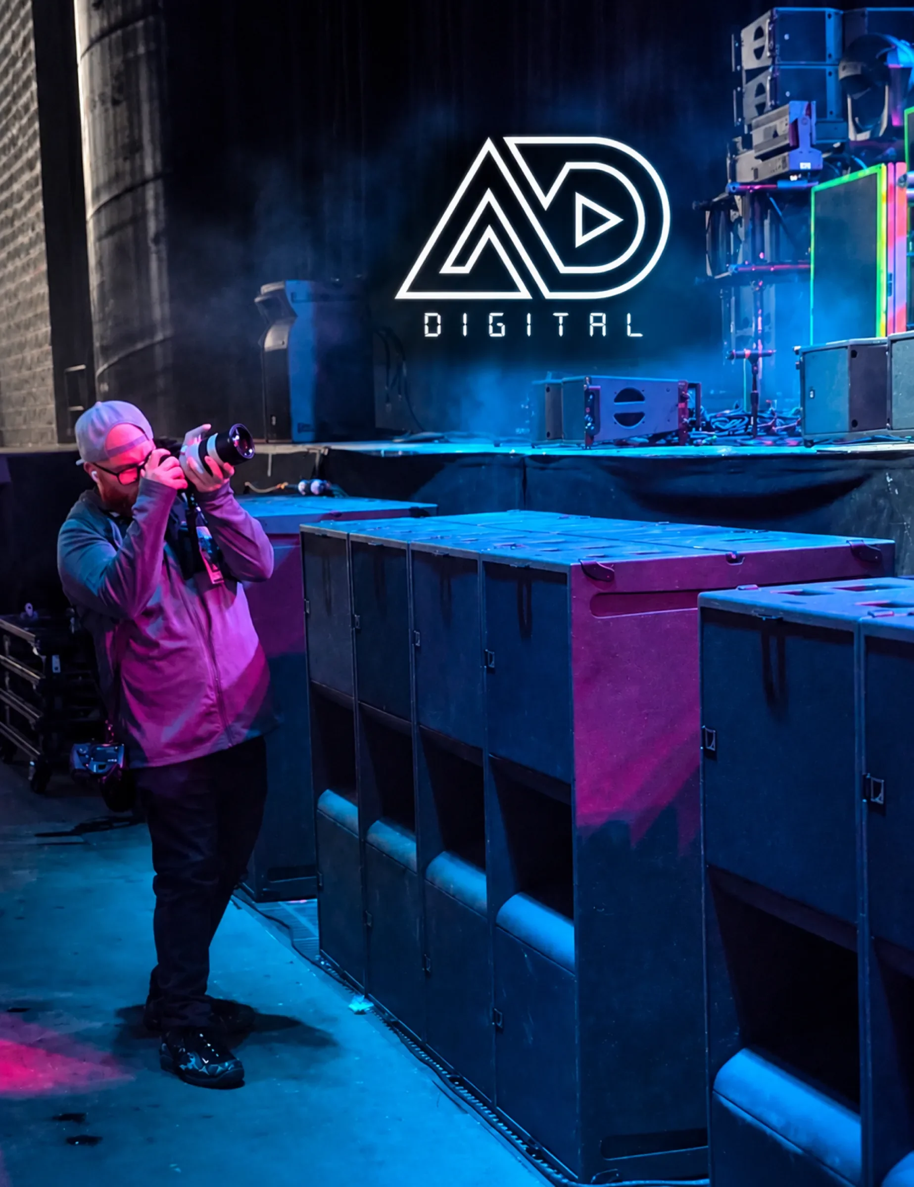 Aiden photographing from the wings with the A.D. Digital mark in the haze
